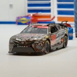 2023 Christopher Bell #20 Interstate Batteries Camo Salutes 1/64 Diecast Chassis